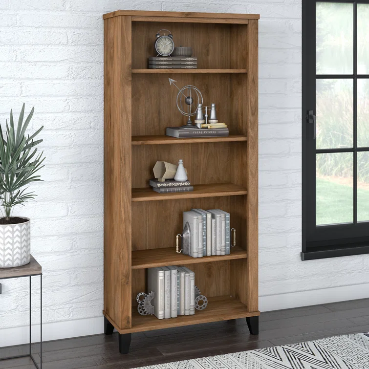 Oak finish solid wood bookcase with adjustable shelves in home office with windows