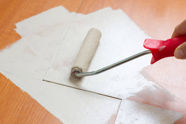 Selection of paint colors for wood furniture with paintbrush, showing best paint options for painting wooden furniture